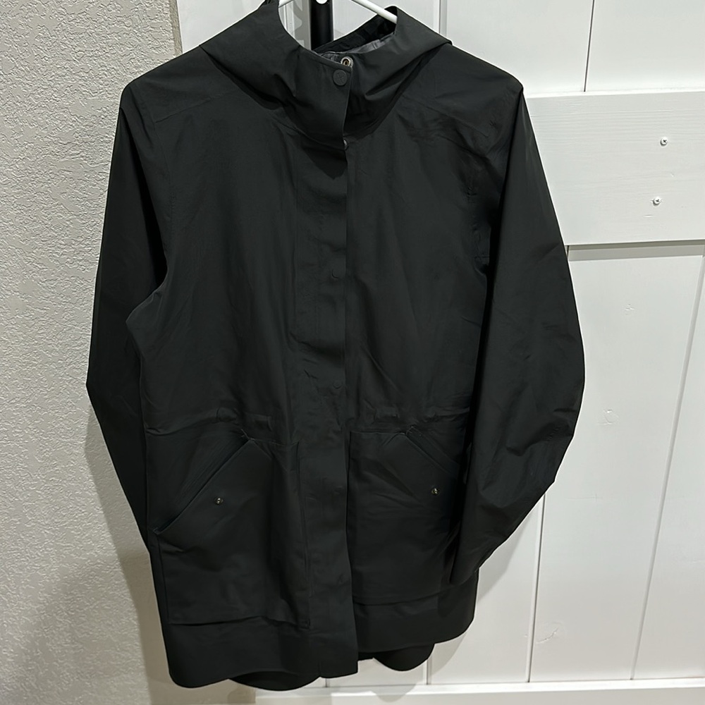 REI co op black rain jacket